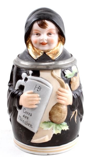 VINTAGE MONK HOFBRAUHAUS BEER STEIN 8 INCHES TALL: Hofbrauhaus vintage beer stein depicting a monk. Measures 8 inches tall and holds 1.5 liters. The Monk's head is the lid, while the cup is the body. There are imperfections in the glaze from the vesse