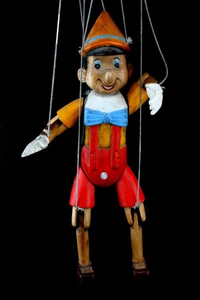PINOCCHIO WOOD MARIONETTE HANDMADE THAILAND: Handmade in Thailand, this is a wonderfully crafted Pinocchio marionette. All of the joints are working well and he is in very good condition. 17 inches tall.