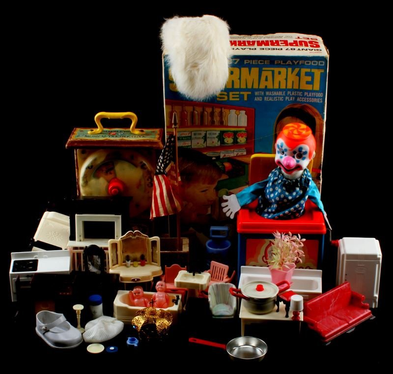 VINTAGE TOY LOT INCLUDES FISHER PRICE & IDEAL TOYS: Vintage toy lot with Norstor Supermarket set, Fisher Price Musical Tick-Tock Clock, Mattel Jack in the Music Box, and Ideal plastic doll furniture. The Fisher Price clock has wear to the faux wood pai