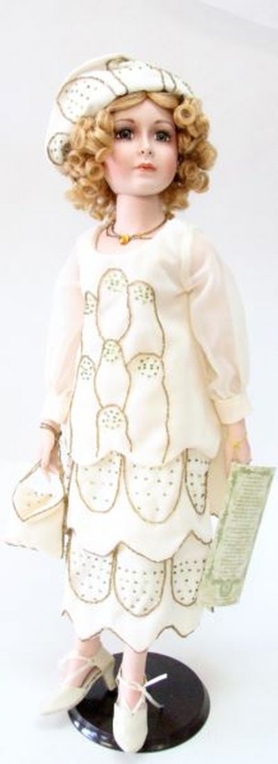 FLAPPER BEATRICE PORCELAIN DOLL MINT IN BOX: Vintage Flapper Beatrice doll, mint-in-box. Designed exclusively for Cracker Barrel Old Country Store. Chiffon dress, bugle beads, curly blonde hair, tags attached. Excellent condition.
