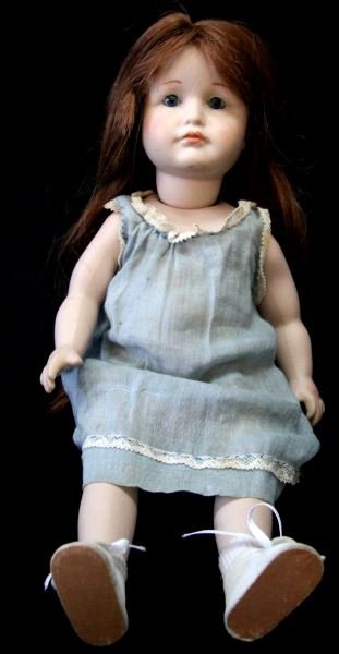 KAMMER & REINHARDT BISQUE CHARACTER CHILD DOLL: German Kammer & Reinhardt porcelain child doll, early 1900's. All porcelain, socket jointed body, 12.5 inches long. Long auburn hair (Cheveux naturels), made in France), pouty lips, blue eyes, origina
