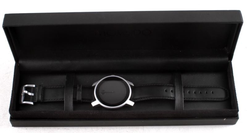 MOVADO "BOLD" MENS/LADIES WATCH ALUMINUM CASE: Back of case is marked "Aluminum Water Resistant, 1291650, MB.01.1.22.6030" and the underside of the genuine leather band is also marked Movado Bold, along with "0022." The matte silver-tone case is 2