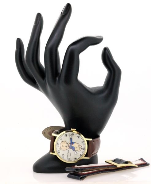 SHEFFIELD VINTAGE CA. 1960'S PORKY PIG WRISTWATCH: Vintage Sheffield Porky Pig wristwatch, Swiss made. Made in the late 1960's or early 1970's. Porky Pig wears white gloves and points at the hour. This watch has a stainless steel back. The watch is fu