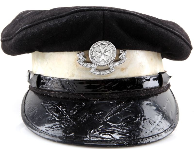 CANADA ST JOHN AMBULANCE BRIGADE VINTAGE VISOR: From the World Police Museum in Milan, Italy this is a vintage Canadian visor cap for an ambulance driver. The cap is free from mothing but has some ripples on the plastic of the visor. Accompanied wi