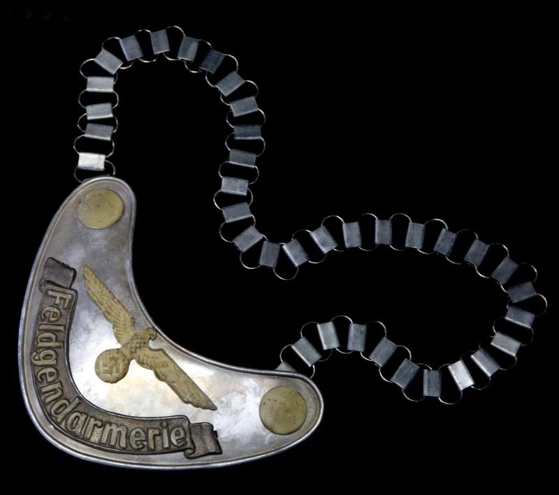 GERMAN WWII THIRD REICH GORGET ARMY FIEDZHANDARM: RZM marked "M34/2". Some discoloring and show of age present to gorget; overall in very good condition. Unauthenticated. as is. This lot has a reserve