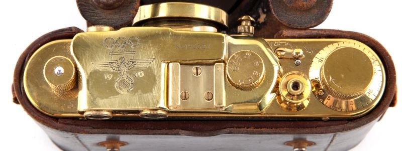 WWII 1936 LEICA BERLIN OLYMPICS: Some wear and show of age present to camera; overall in very good condiiton. Unauthenticated. This lot has a reserve