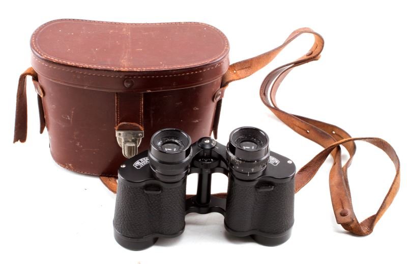 VINTAGE CARL ZEISS JENA GERMAN BINOCULARS 8X30: Vintage Carl Zeiss Jena 8x30 binoculars in hard leather case. Crisp clear lens, focus knob twists freely, some loss to black finish and minor scuff marks. Brown hard leather case has wear and broken s