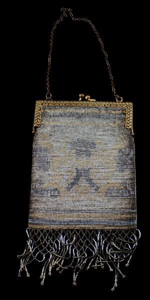 ANTIQUE FRENCH METALLIC STEEL BEAD PURSE TRI COLOR: Antique steel bead purse made in France. The steel beads, colored silver, and two shades of gold, form floral and geometric patterns. The frame is decorated with a woven or foliated pattern. The purse