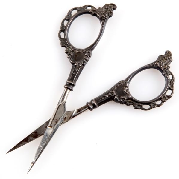 ANTIQUE SILVER EMBROIDERY SCISSORS FOSTER & BRO: Sterling silver embroidery scissor by Theodore W Foster & Bro. This company produced jewelry and sterling items from 1898 to 1951. The handles are covered in floral designs. The silver is tarnished, b