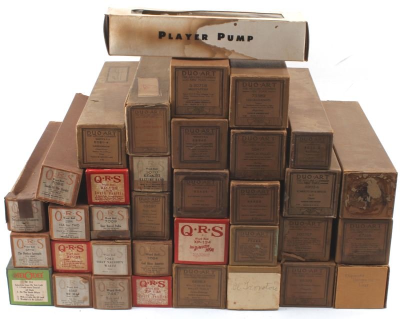 LARGE LOT OF 178 ANTIQUE PIANO ROLLS DUO-ART/QRS: Large lot of antique piano rolls for player piano. Featuring 163 rolls manufactured by Duo-Art, 14 by QRS, and one by Mel-o-dee. All have outside boxes in good condition for age. Not tested. This lot 