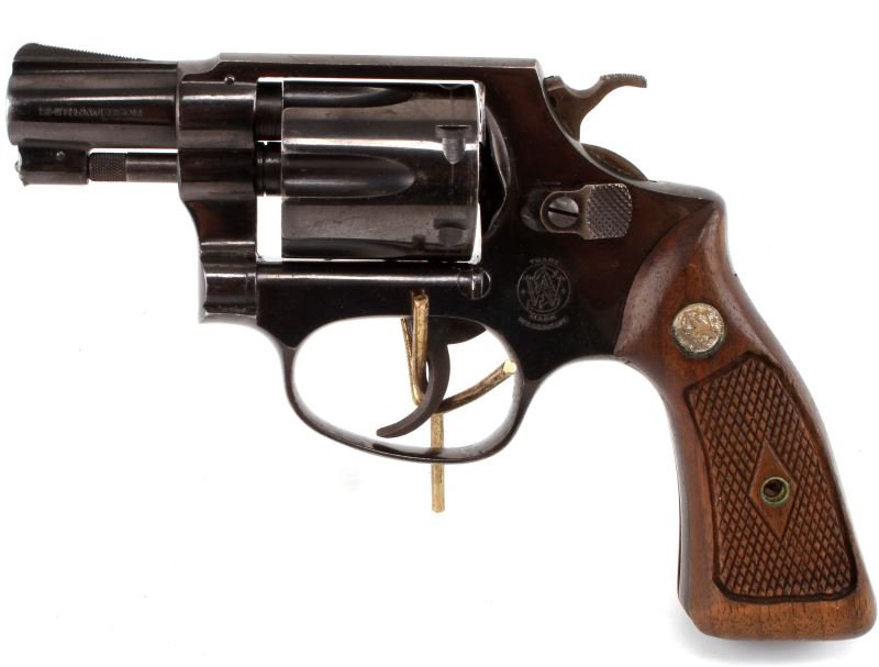 SMITH & WESSON 31-1 REVOLVER WOOD GRIP .32 LONG: Smith & Wesson 32 Long Revolver. 6-shot blue steel with wood grips, 2 inch barrel. Bore is bright and clean. Serial # to inside chamber is 81808. Serial # to butt plate is 789261. Very good condition.