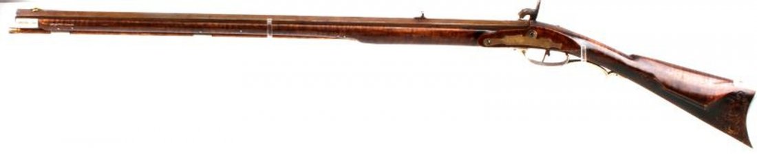 42 INCH TIGER STRIPE BLACK POWDER PERCUSSION RIFLE: 42 inch tiger stripe patterned black powder percussion rifle. 28 inch octagonal barrel. Fixed sights. Silver-colored buttplate, trigger guard, and thimbles. Silver-colored patch box. Brass-tipped wood