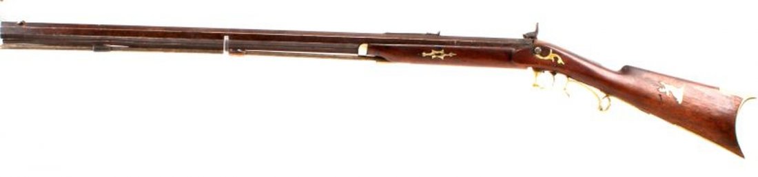 48.25 INCH PERCUSSION BLACK POWDER RIFLE: 48.25 inch percussion black powder rifle. 32.25 inch octagonal barrel. Fixed sights. Brass buttplate and trigger guard. Wooden ramrod. Metal deer emblem on side of stock. Lower thimble bent downward. 