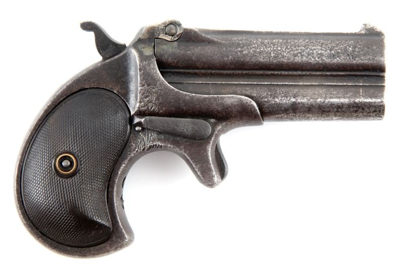 REMINGTON ARMS .41 CALIBER DERRINGER: Remington .41 caliber derringer. "REMINGTON ARMS--U.M.C. CO. ILION NY" etched on top of barrel. Hammer mechanism not functional. Surface has some pitting.