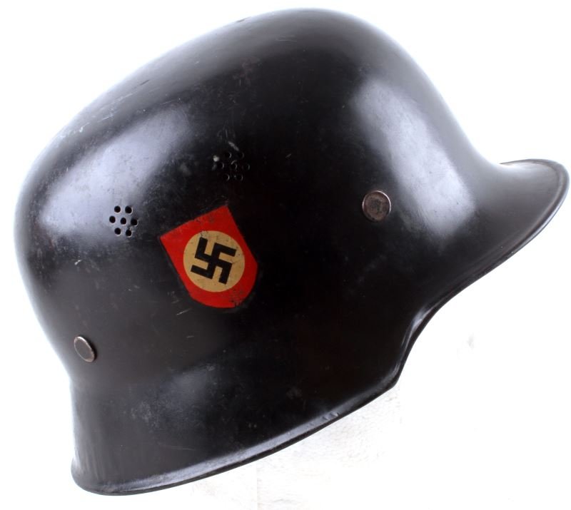 WWII GERMAN M34 DOUBLE DECAL POLICE FIRE HELMET: M34 helmet with intact liner and neck cover tabs. Stamped with a "Q" inside near left ear. Some minor loss to decals. Liner has some losses and the strap is broken but present. Overall good to very go