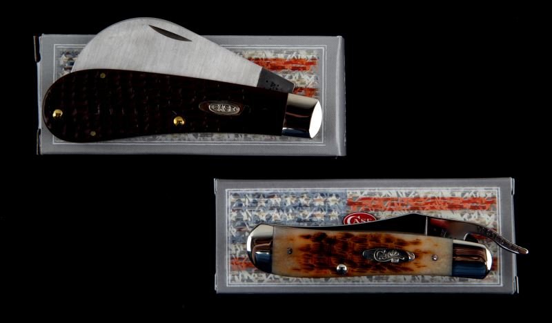 CASE KNIFE LOT OF 2 RUSSLOCK & HAWKBILL: Each knife is new in box and include, 00016 31011SS Hawkbill brown and 00260 61953LSS Russlock Amber.