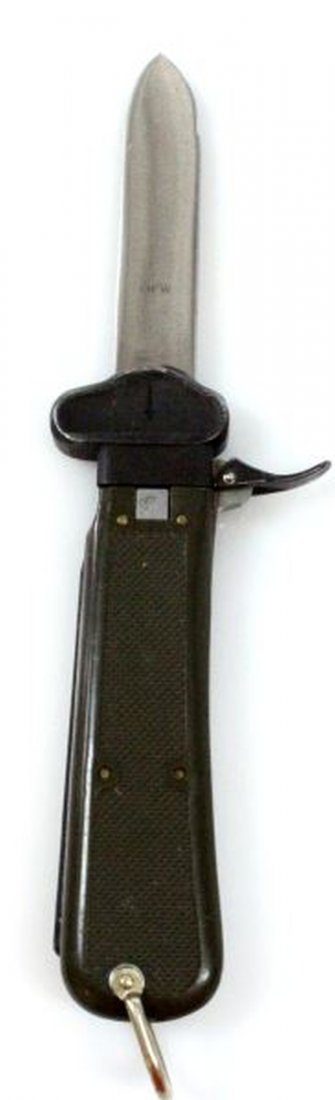 GERMAN POST WAR FALLSCHIRJAGER GRAVITY KNIFE: Excellent near new condition, handle stamped BUND for Bundeswehr Military, blade of 440A steel and stamped OFW, early version 1947-1962, opened length 10 inches.