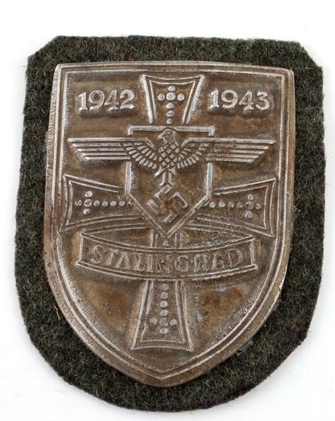 GERMAN THIRD REICH WWII STALINGRAD SHIELD: Some discoloring and show of age evident; overall in very good condition. Unauthenticated as is. This lot has a reserve.