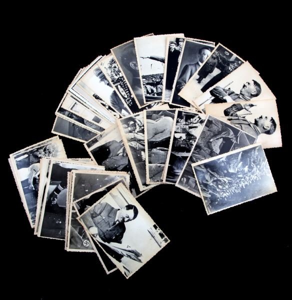 GROUP OF 60 PHOTOGRAPHS OF HITLER FROM ARCHIVES: Lot of 60 photographs from the Ukrainian archives, all photographs depict Hitler. The photographs show him with advisors, at rallies, in casual settings, and more. Unauthenticated. This lot has a rese