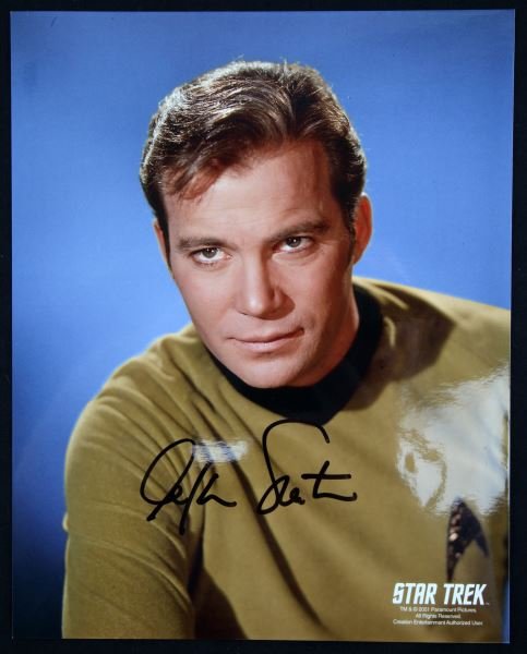 AUTOGRAPHED PHOTO OF 8x10 WILLIAM SHATNER: 8x10 lab photograph featuring William Shatner; Captain James T. Kirk of the Starship Enterprise. Autograph guaranteed authentic. In very good condition.