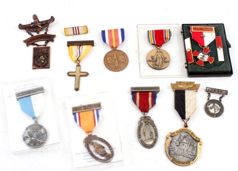 LOT OF 10 MILITARY BOY SCOUT ETC MEDALS W RIBBONS: Mixed lot of vintage and modern medals with ribbons. The first item in this lot is the Ad Altare Dei Catholic Boy Scouts medal with ribbon and bar. Vintage piece. The second medal is a Life Saving med