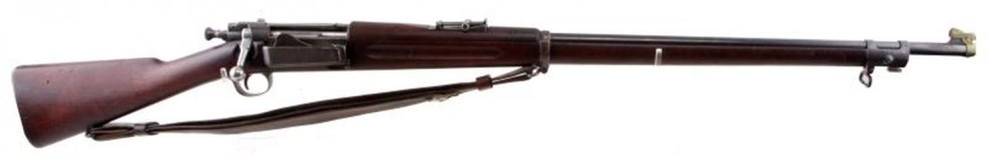 SPRINGFIELD MODEL 1896 KRAG RIFLE DATED 1897: Model 1896 Krag rifle with stock cartouche with 1897 date and "P" proof marks behind the trigger guard. In overall very good to excellent condition with original sling (some leather cracking). Also wi