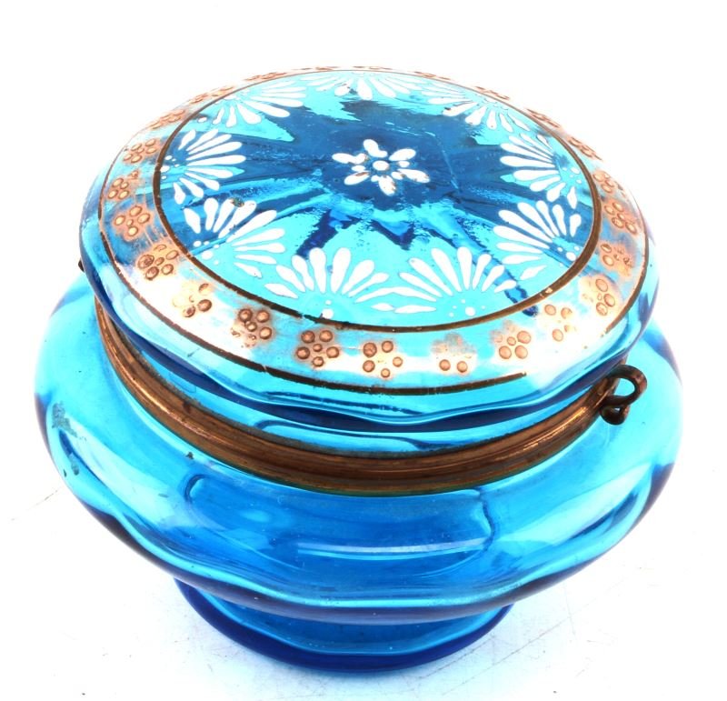 SMALL VINTAGE BOHEMIAN GLASS BLUE TRINKET BOX: Hand painted vintage blue Bohemian glass trinket box. The hinged lid is painted with gold and white floral and geometric motifs. Very good condition, no chips or cracks. 3 inches tall with 3 inch diam