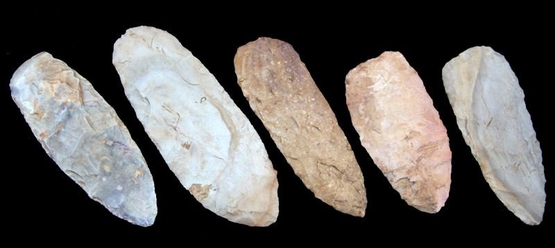 5 BLADE CACHE PREFORMS BURROWS CAVE ILLINOIS: 5 Blade cache / preforms made of white beige and pink chert and/or limestone. Measure between 4.5 to 6.5 inches. Two are marked (Burrows Cave, Illinois). Some debitage in the recesses and river marks.