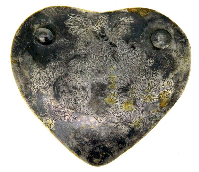 ANTIQUE HEART SHAPED GORGET WITH HERALDRY: Small silver heart shaped gorget with engraved heraldry. No apparent hallmark or maker's mark. Tarnished but overall good condition. Most likely a silver trade piece. 3 inches wide by 2.5 inches tall.