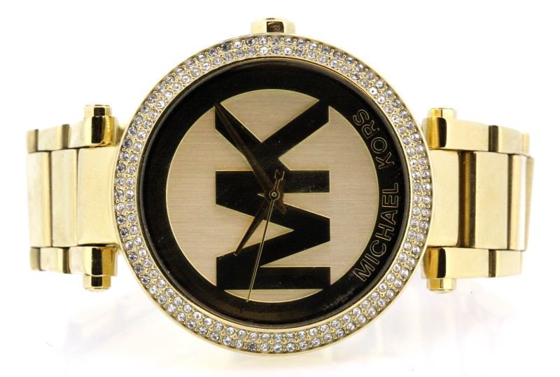 MICHAEL KORS PLATED FASHION WATCH MK5784: A durable gold plate over stainless steel, and crystal-adorned bezel adds longevity and trendy style to this fashionable Michael Kors timepiece. A quartz movement and smooth, easy-to-read dial complet