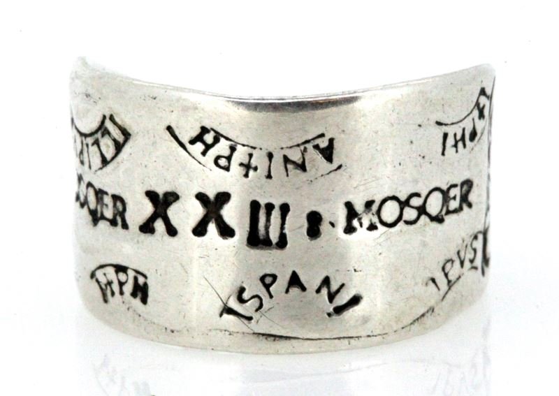 ATOCHA SILVER RING RECOVERED SILVER SHIP WRECK: Vintage ring made from recovered silver found on the Atocha ship wreck. The ring is a size 8 and weighs 4.4 grams. The interior is engraved "Atocha 1627", the exterior has various hallmarks. Very good