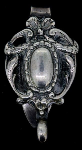 HALLMARKED SILVER CHATELAINE CLIP ANTIQUE: Antique hallmarked chatelaine clip with foliated and geometric designs. The hallmark is unidentified but is comprised of two cartouches. The first cartouche is split, with an eagle at the top and thre