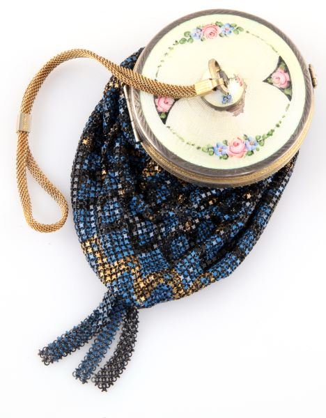 ANTIQUE PAINTED COMPACT MESH PURSE WITH ENAMEL LID: Antique painted compact mesh purse with enamel lid and tassel. The mesh purse is painted with geometric patterns in blue, black and gold. The enamel lid is painted with rosettes, flowers and leaves. T