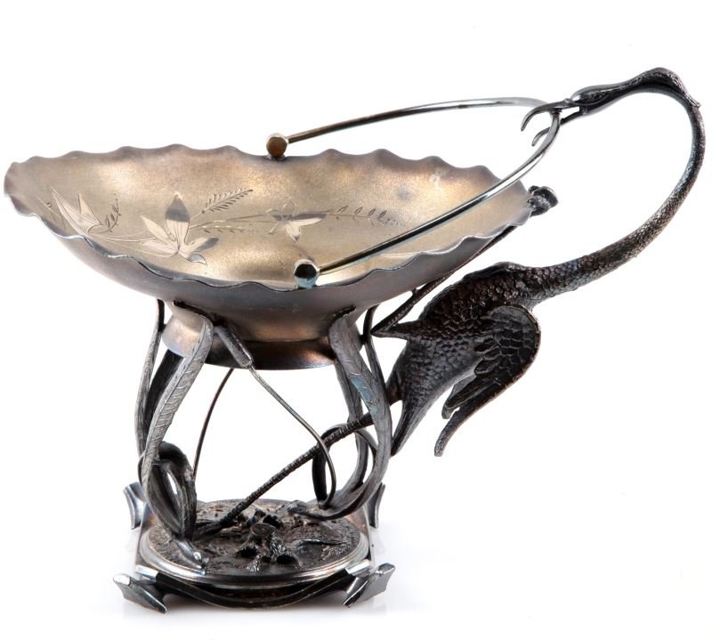 WILCOX SILVERPLATE VICTORIAN CRANE CENTERPIECE: Fine figural centerpiece by Wilcox Silverplate Co. and marked on bottom of base with logo and "01800". 8 inches tall by 11 long. Oval bowl features Victorian chasing and is named to "Annie E. Clark". 