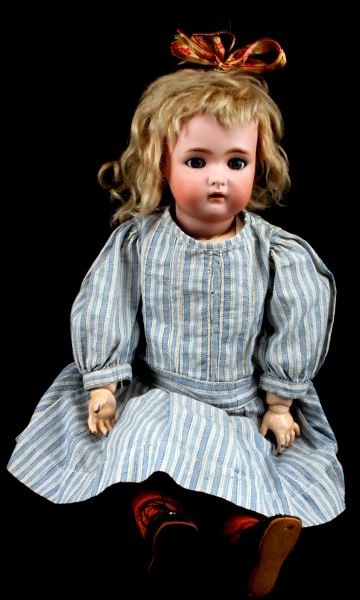 ANTIQUE KAMMER & REINHARDT BISQUE DOLL 18 INCHES: Kammer & Reinhardt doll with Simon and Halbig bisque head. Antique doll in very good condition. This doll has wavy blond hair, sleepy blue eyes, and a partially open mouth. She has articulated arms an