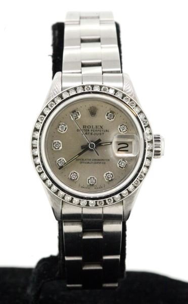 LADIES VINTAGE STEEL ROLEX W/ DIAMOND DIAL/BEZEL: Stainless steel Oyster case, model number 6917, perpetual movement serial number 3476234, dating watch to 1971. Features round brilliant cut diamonds, set into bezel and diamond dial, both non-Rolex a