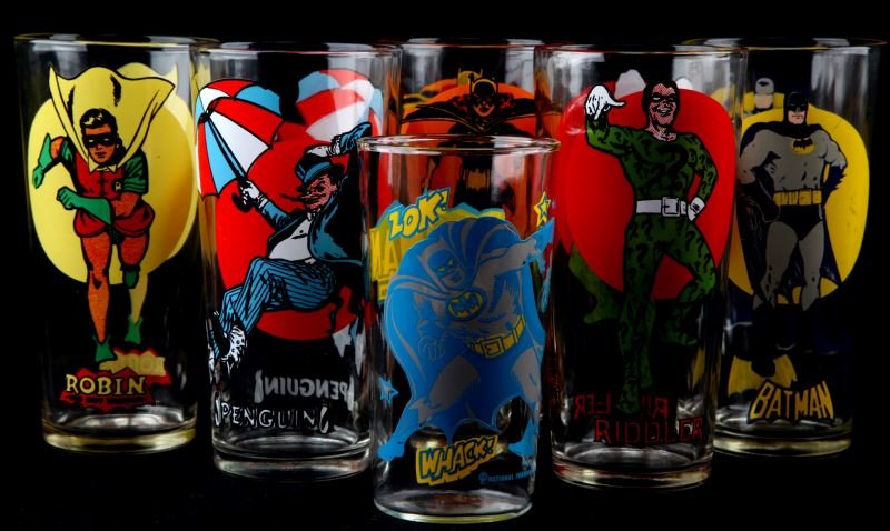 LOT OF SIX VINTAGE BATMAN PEPSI SUPER SERIES CUPS: Lot of six vintage Pepsi Super series glass cups. The following characters are seen on the cups: Batman, Robin the Boy Wonder, Batgirl, Penguin, and the Riddler. Set includes five 6 inch cups and one