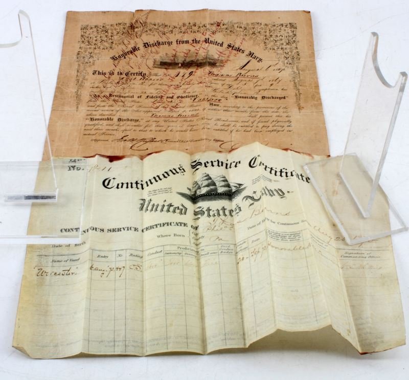 WWI US NAVY SERVICE & DISCHARGE DOCUMENTS: WWI US Navy Continuous Service and Honorable Discharge certificates. Hand-written and dated 1870 and 1864. Named to Thomas Burns. Honorably discharged from the US flagship "Ossipee". Good condition fo