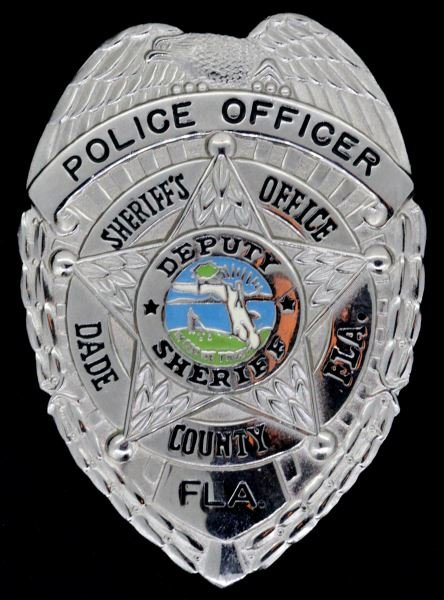 SHERIFF'S OFFICE POLICE BADGE DADE COUNTY FLORIDA: Full size just under three inches, Police Officer obsolete badge, very good condition.