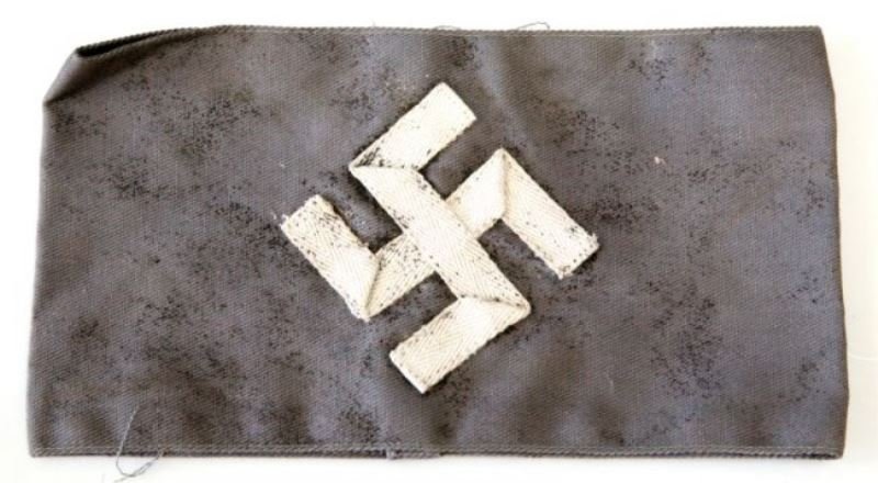 WWII 2 PIECE GERMAN THIRD REICH GREY ARMBAND: Sewn white Swastika on grey twill cloth, best suggestion for this piece is black and white movie prop.