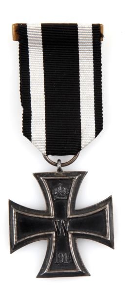 WWI IRON CROSS SECOND CLASS WITH RIBBON: WWI Iron Cross second class with ribbon. "800" marked on ribbon ring. Magnetic. "W" and "1914" marked on one side of cross. "FW" and "1813" marked on reverse side. Clasp functional. Overall very good 