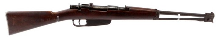 ITALIAN CARCANO MODEL 1891 CAVALRY CARBINE RIFLE: Italian Carcano Model 1891 cavalry carbine 6.5x52mm bolt action rifle. "Gardone" etched into top of rifle. Fixed front and rear sights. Folding bayonet. Two rifle strap loops. "RB May 10 1921" scratch