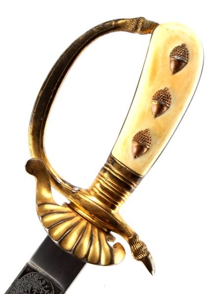 WWI SENIOR FORESTRY OFFICIAL'S CUTLASS BY EICKHORN: Forestry Leader's dagger with brass grip assembly embellished with pre-ban ivory, which is decorated with acorns. Stag leg crossguard and clamshell guard. The blade is etched with stylized vegetation 