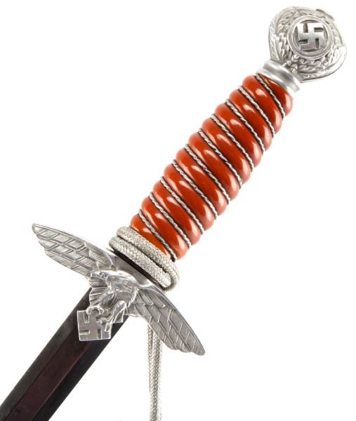 WWII THIRD REICH 2ND MODEL LUFTWAFFE DAGGER: Second model Luftwaffe dagger. Stamped with SMF maker's mark with king motif on blade. Blade is in good condition, with some patina. Crossguards and pommel are in very good shape, and possess deep det