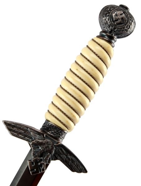 WWII THIRD REICH GERMAN 2ND MODEL LUFTWAFFE DAGGER: A second model Luftwaffe dagger with scabbard. Blade’s reverse is stamped with Paul Weyersberg & Co., Berlin manufacturer’s mark. Blade is in very good condition, much of the factory crossgrain pr