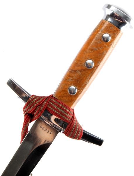 SCARCE SWISS ARMY DAGGER WITH PORTEPEE: A scarce Swiss army dagger made by Elsener, Schwarz. Includes correct Swiss army portepee. The chromed pommel and crossguard are bright and in very good condition. The wooden grip has no cracks or dam