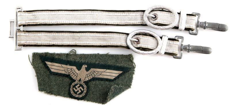 WWII THIRD REICH HEER ARMY DAGGER HANGER AND PATCH: Heer dagger hanger; silver with green backing and white metal hardware. In very good condition. Also a Heer breast eagle; Grey on feldgrau cloth. Both items are in very good condition.