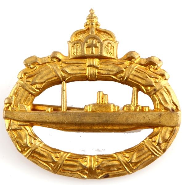 WWI IMPERIAL GERMAN U-BOAT MEDAL IN GOLD: An Imperial German U-boat medal. Features a wreath of oak leaves encompassing a submarine. The rear is marked with "WALTER SCHOT, fec". It has a horizontal pin with "C" clasp and 180 degree lie. Measu