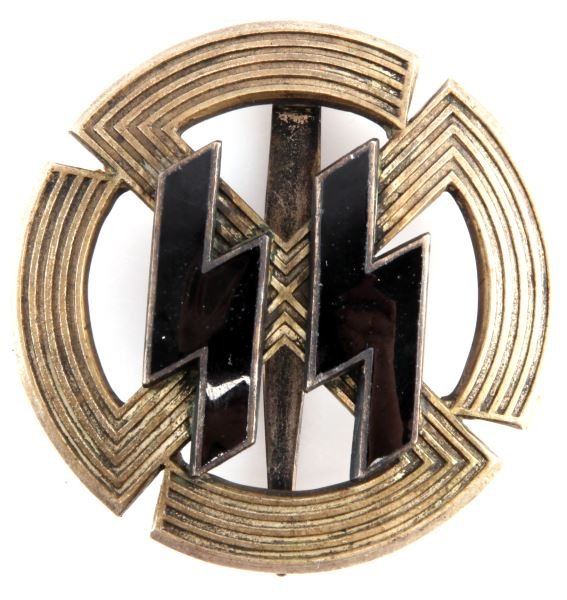 THIRD REICH SILVER SS SPORTS PROFICIENCY BADGE: An SS Sports Proficiency badge in silver. Features a pair of black enameled runes with silver plated edges attached with four flattened pins to a convex mobile swastika. The rear is unmarked, and has 