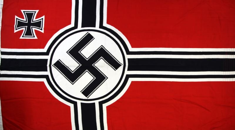 REICHSKRIEGSFLAGGE WWII GERMAN WAR ENSIGN: World War II German war ensign, the Reichskriegsflagge. This design was used from 1938-1945. The flag measures 100 by 170 cm. The flag has a maker mark and reads "Df. Reichskriegsff" with some illegib